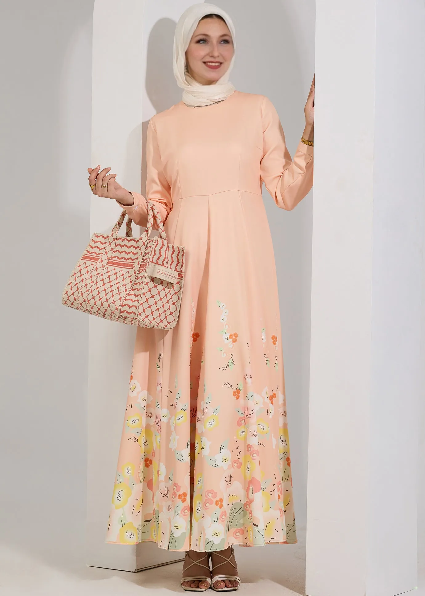 Rania Ethereal Bloom Modest Maxi Dress in Pastel Peach with Floral Hem